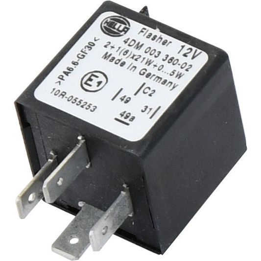 A black 12V flasher relay with metal prongs, made in Germany, displaying technical specifications on its surface. It is labeled "Sparex" and model number "S.43933." Compatible with Massey Ferguson machinery, it's similar to the S.43933 model.
