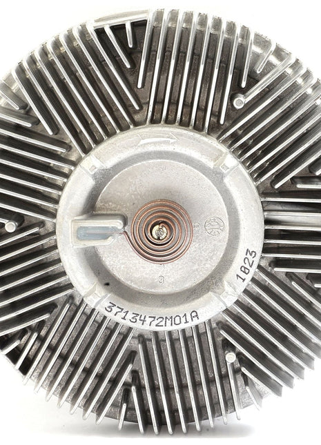 An up-close image of a metal Viscous Fan Drive with visible fins and a central mounting area. The product, model number "37134-7ZMO1A" and the number "1823", is ideal for Massey Ferguson vehicles and distributed by Sparex under the part number S.104717.