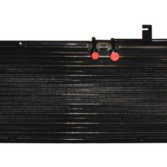 A Sparex Condenser, designed for Massey Ferguson tractors, features a black radiator with red caps attached to two top inlet/outlet pipes and is displayed against a white background.