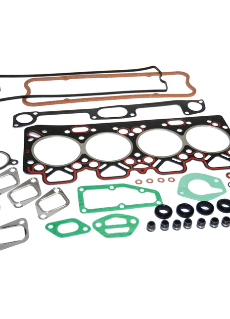 A collection of various car engine gaskets, including head gaskets, valve cover gaskets, and seals, arranged on a white background. Featuring the Sparex Top Gasket Set (400, 5000, Brazilian, Series) | Part No. S.107287 compatible with Perkins Engine and Massey Ferguson.