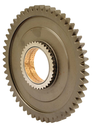 Close-up view of the Sparex Transmission Gear - 12 Speed (Sparex Part No. S.107307) featuring evenly spaced teeth around its circumference and a smaller, perforated central hole, reminiscent of those used in Brazilian tractors by Massey Ferguson.