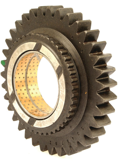 A close-up of the Sparex Transmission Gear - 12 Speed (Sparex Part No. S.107317) with angled teeth and a hollow center, reminiscent of classic Massey Ferguson tractor parts, against a white background.