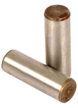 Two cylindrical metal rods, one laying horizontally and the other standing vertically, both showing signs of wear at the ends, reminiscent of a worn Pin from Sparex machinery, specifically part number S.107335.