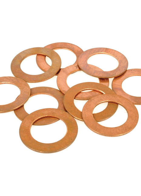 A collection of flat, round copper washers with central holes, perfect for Massey Ferguson machinery, on a white background. These are listed as Washer (8 Spd) | Sparex Part No. S.107336 from the Sparex brand.