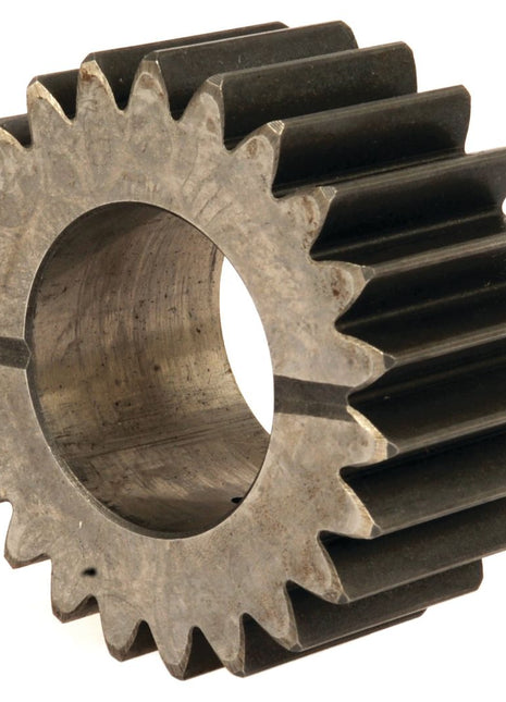 A close-up of the Sparex Transmission Gear - 8 Speed (Sparex Part No.S.107340), featuring straight teeth and a circular central hole, compatible with Massey Ferguson machinery.