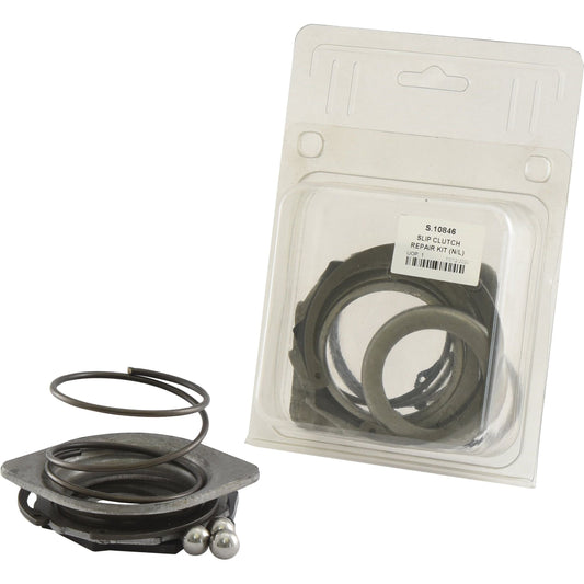 Displayed next to its packaging, the 8-piece Sparex SLIP CLUTCH REPAIR KIT (N/L) | Sparex Part No.S.10846 includes essential components such as a spring, metal discs, and balls. Ideal spares for repairing slip clutches.