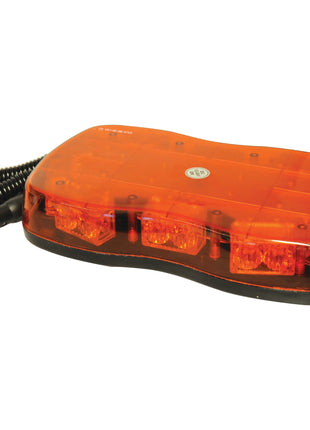 The Sparex LED Micro Hazard Light, Interference Class 3, features both single and double flash functions and operates on 12-24V. It comes with an amber lens, coiled power cord, and plug for vehicle use. With an IP65 rating, this light ensures durability and reliability in various weather conditions. Product code: S.113209.