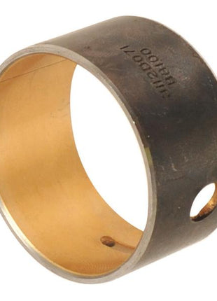 The Sparex | Camshaft Bush is a cylindrical metal bushing with a side hole, boasting an interior gleaming gold lining, tailored for Perkins Engines.