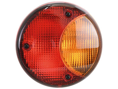 The Sparex Rear Combination Light (Halogen) with Sparex Part Number S.151640 is a round vehicle tail light lens featuring red and amber sections under a clear cover. It is secured by four screws and includes a replacement bulb for optimal visibility at 12V, suitable for various functions on the right-hand side of your vehicle.