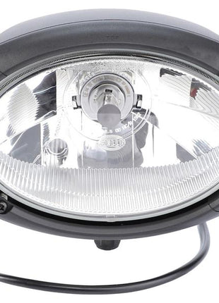 Introducing the Sparex Head Light (Halogen) 12V, part number S.151747—a black oval-shaped headlight with a metal frame and a clear lens, showcasing the 12V halogen bulb and internal components.