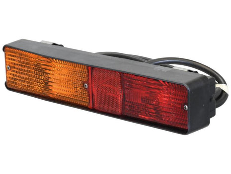 The Sparex Rear Combination Light (Halogen), featuring two orange and two red lens panels housed in black plastic with visible electrical wiring at the rear, is designed to ensure safety and visibility with its 3-function brake, tail, and indicator lights. Operating at 12V, it is cataloged under Sparex Part Number S.160697.