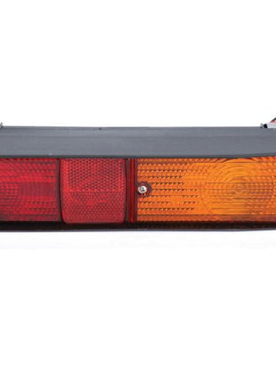 Close-up of a Sparex S.160720 Rear Combination Light with rectangular red and amber polycarbonate lenses, featuring reflective segments, an attached wiring harness, and utilizing a halogen light source for brake, tail, and indicator functions (LH), 12V.