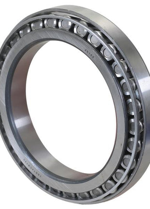 A close-up view of a cylindrical roller bearing with a metallic outer ring and multiple cylindrical rollers, resembling the precision seen in the Sparex Taper Roller Bearing (JP13049 JP13010), Sparex Part Number S.161240.