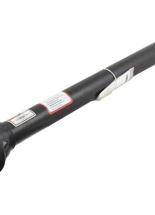 The Sparex PTO Shaft, Part Number S.164261, features a black driveshaft with labels and connectors attached. It boasts a cylindrical shape with wider ends, designed to handle high torque. Measuring 710mm in length and equipped with 1 3/8'' x 6 Spline Q.R. to 1 3/8'' x 6 Spline Q.R., this shaft is perfect for PTO series applications and includes detailed universal joint dimensions for optimal compatibility.