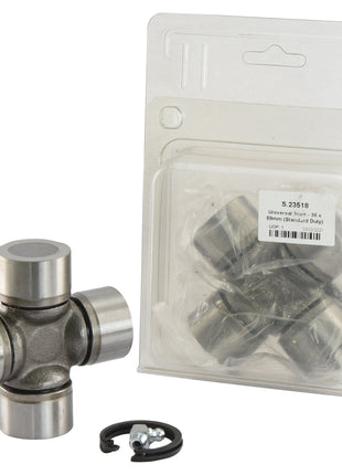 A universal joint with its components laid out includes a cross-shaped metal piece, hardware, and an extra identical joint in a Sparex plastic package for the Universal Joint - 36 x 89mm (Standard Duty) (Agripak 1 pc.) | Sparex Part No. S.23518.