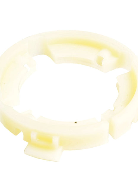 A white, circular plastic component with multiple notches and cutouts around its edge, potentially used for mechanical or industrial applications like the Sparex PTO BEARING-EASYLOCK 67X103MM (Sparex Part No.S.23997).