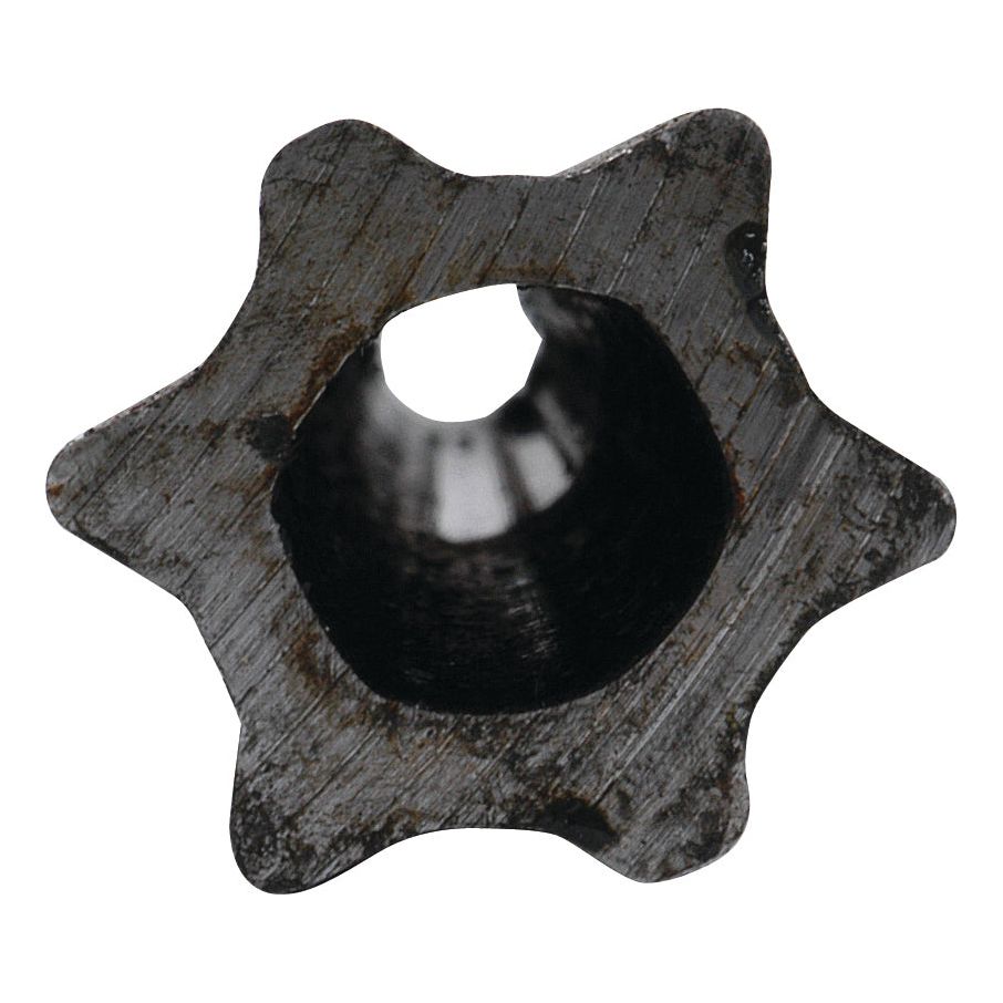 Close-up of a six-pointed, star-profiled PTO tube with a hollow center and a textured, worn surface, resembling the Sparex product S.24820.
