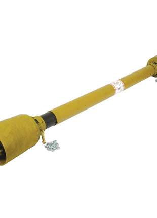 A long, yellow-brown metal shaft with cylindrical ends, resembling an industrial tool or machinery component from the German Series AW20/W2200 can be described as the Sparex PTO Shaft - (Lz) Length: 1050mm, 1 3/8'' x 6 Spline Q.R. to 1 3/8'' x 6 Spline Overrunning Clutch - S.26778.