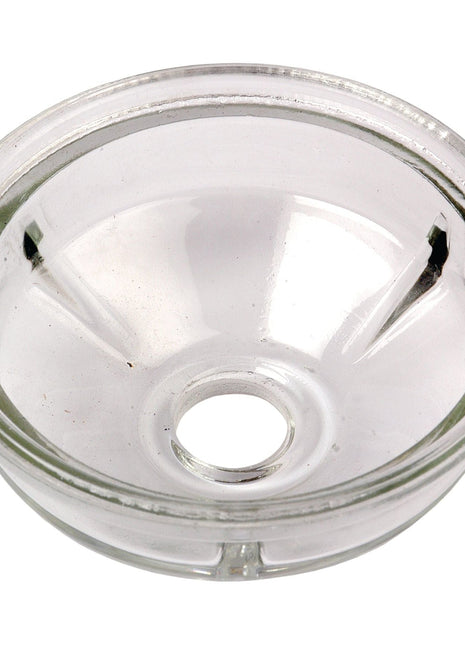 A clear, round glass bowl with a central hole, smooth surface, and slightly raised edges—ideal as a replacement fuel bowl for an Allis Chalmers 5040—available as the Sparex Fuel Bowl (Part No. S.40572).