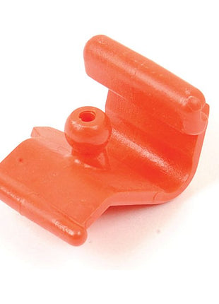 A small, bright orange plastic PTO GREASE NIPPLE LOCK by Sparex (Part No. S.56509) featuring a cylindrical protrusion and an L-shaped angle.