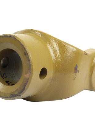 A yellow metal mechanical component with cylindrical holes on both ends, possibly part of a larger machine or engine, might be the Sparex PTO Yoke - Pinhole Yoke (U/J Size: 30.2 x 92mm), Bore Ø40mm, Pin Ø: 13mm (Part No. S.6518).