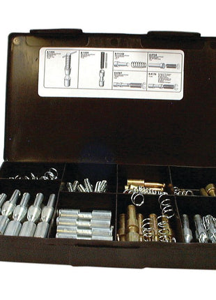 A black plastic box labeled as PTO Yoke Pin Kit (Handipak 38 pcs.) - Sparex Part No. S.6530 is open, displaying its organized compartments containing assorted metal fasteners and springs, along with a parts guide affixed to the lid.