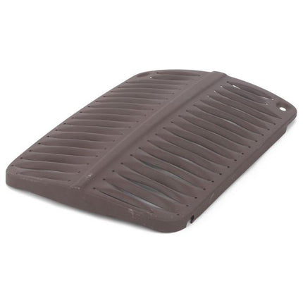 A brown rectangular silicone drying mat with raised ridges for airflow is displayed, much like the AGCO Massey Ferguson - Front Grille 35/35X - 826812M91 in its simplicity and functionality.