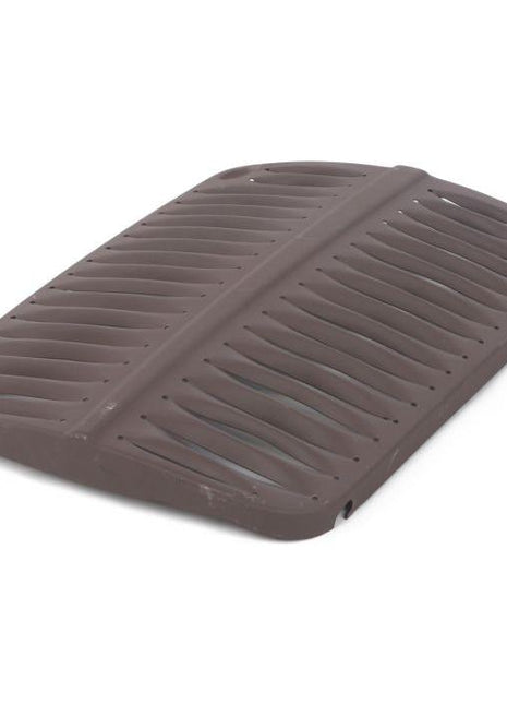 A brown rectangular silicone drying mat with raised ridges for airflow is displayed, much like the AGCO Massey Ferguson - Front Grille 35/35X - 826812M91 in its simplicity and functionality.