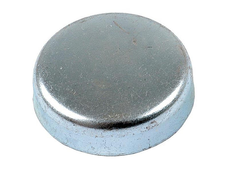 A core plug from Sparex, specifically the 1 1/4'' cup type mild steel variant (Sparex Part Number: S.8449), features a silver metal cap with a smooth, rounded surface and slight wear marks, showcasing the same sturdy construction seen in other mild steel products.