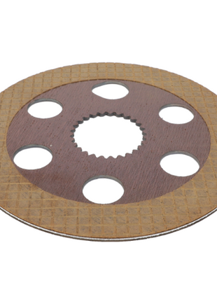 A circular brake pad for a Massey Ferguson tractor by AGCO, featuring a series of large holes near the center and a textured surface around the outer edge. Product Name: Massey Ferguson - Brake Disc - ACW0662520. Part number 3823952M1.