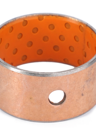 An AGCO cylindrical metal bearing with an orange interior and a small hole on one side, specifically designed for the Massey Ferguson Loader, available as the Massey Ferguson - Bush - AL5018514.