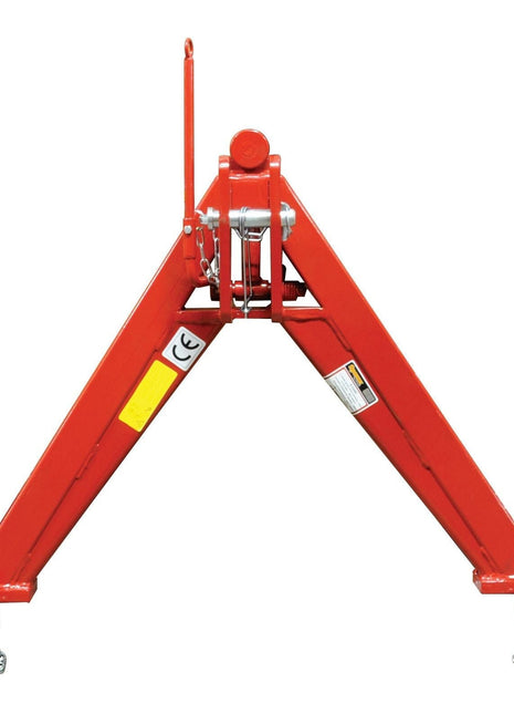 The Sparex A Frame Quick Hitch System (Cat.2) - S.23464, CE Approved, is a red lifting beam featuring a triangular frame with safety stickers. It includes side roller wheels and a handle on top. Designed to meet Cat. 2 standards, this system ensures safe and efficient lifting operations with its impressive load capacity.