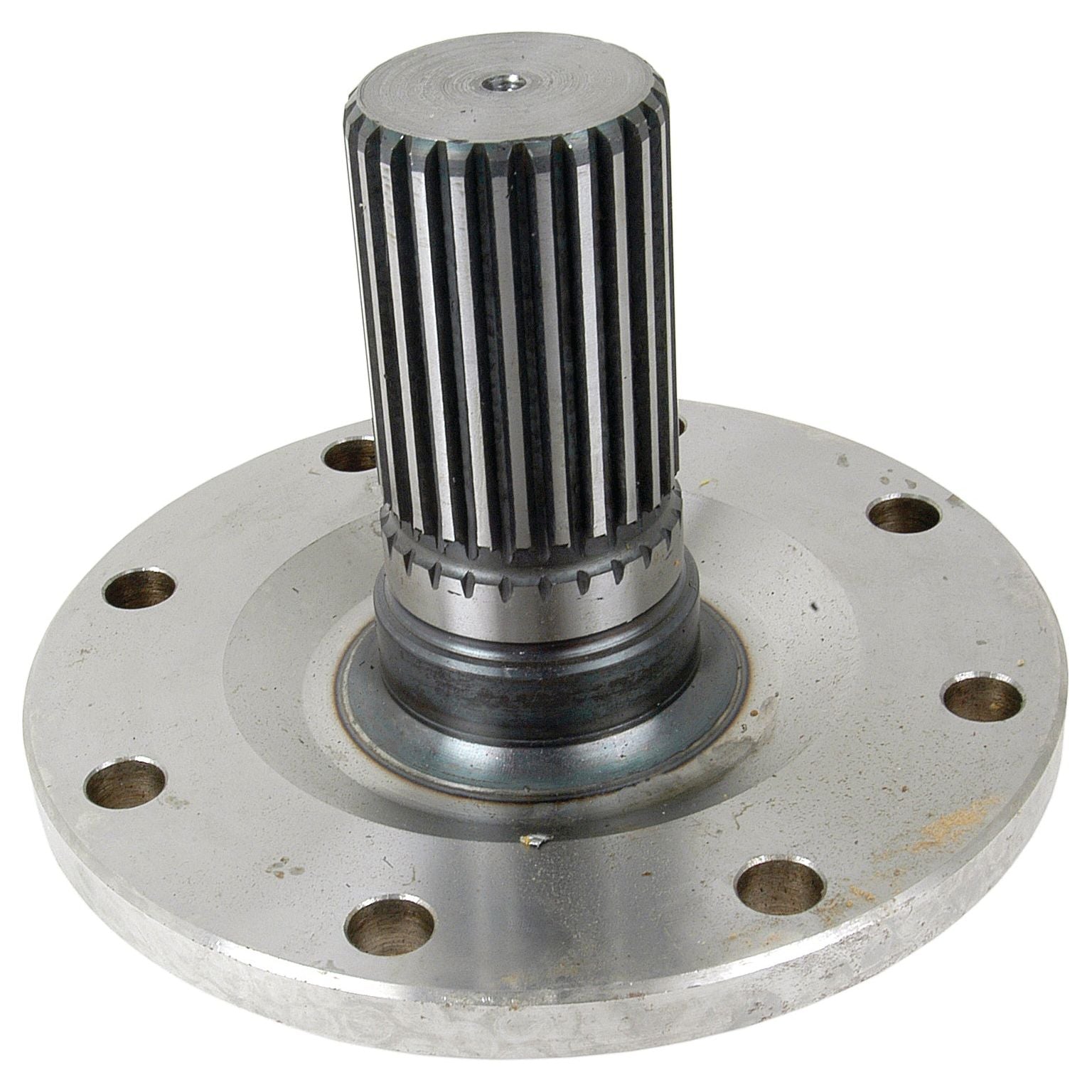 Close-up of a metallic mechanical component with a round base and multiple holes, featuring a central cylindrical gear-like structure with ribbed sides, reminiscent of the Sparex Axle Shaft (Part No. S.41572) used on Massey Ferguson equipment.