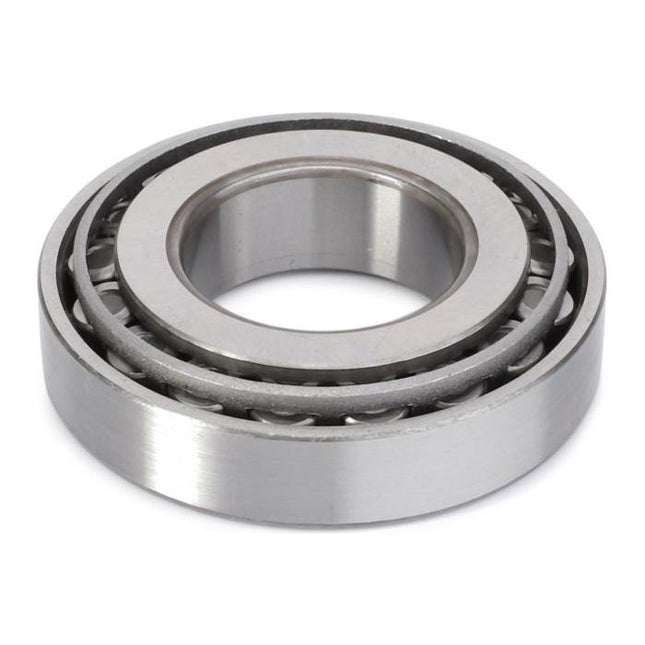 The AGCO Massey Ferguson - Bearing - 339481X1 is a metal roller bearing featuring a circular shape, inner and outer raceways, and visible cylindrical rollers, making it suitable for use in Massey Ferguson 3000 Series tractor parts.