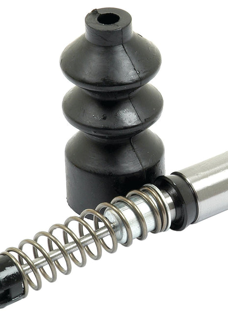 Close-up of a black automotive brake caliper guide pin boot and a metal guide pin with a spring attached, reminiscent of the precision found in the Sparex Brake Master Cylinder Repair Kit (Sparex Part No. S.42317).