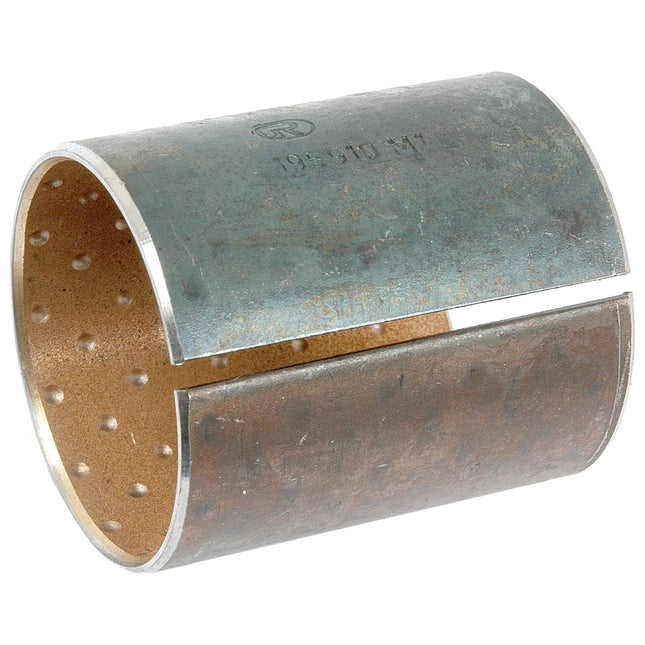 A weathered and used cylindrical, metal, split bushing with an inner copper layer featuring dimples, likely from a Massey Ferguson 135 brake pedal. It matches the Sparex Brake Pedal Bush, Sparex Part No. S.41619.