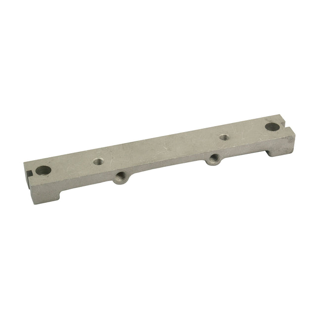 The Bridge Piece (Sparex Part No.S.41865) by Sparex, a sturdy rectangular metal bracket with multiple holes, is viewed from an angle on a white background. This durable component is perfect for use in Massey Ferguson machinery or as a replacement part compatible with Sparex Perkins components.
