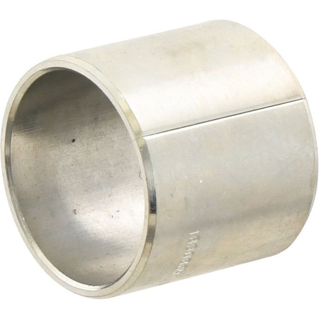 A Sparex Spindle Bush, Sparex Part No. S.40225, is a metallic cylindrical sleeve with a noticeable vertical seam running along its side, commonly used in Massey Ferguson machinery.