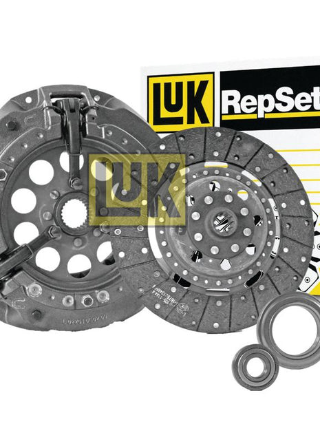 A Sparex Clutch Kit with Bearings - S.127055, featuring a pressure plate, clutch disc made of organic material, release bearing, and pilot bearing, is displayed with the Sparex branded packaging in the background.