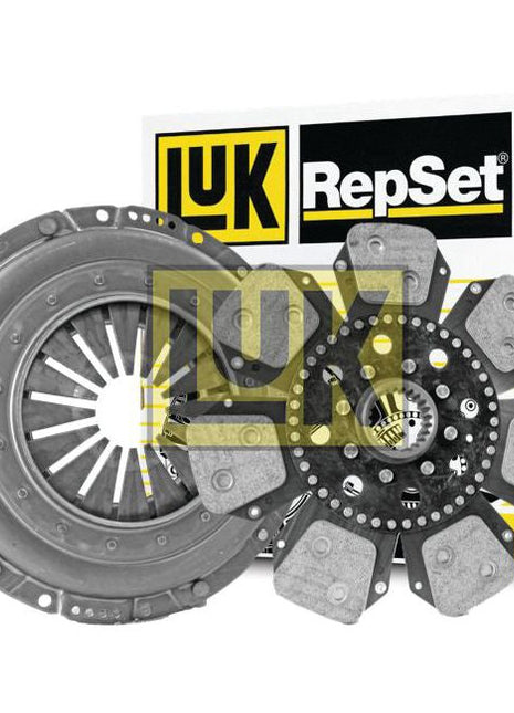 A car clutch kit containing a pressure plate and friction disk, featuring a Sparex Captive Disc and Single Cover, displayed in front of a yellow and white box labeled "LuK RepSet", identified as Clutch Kit without Bearings - S.73169.