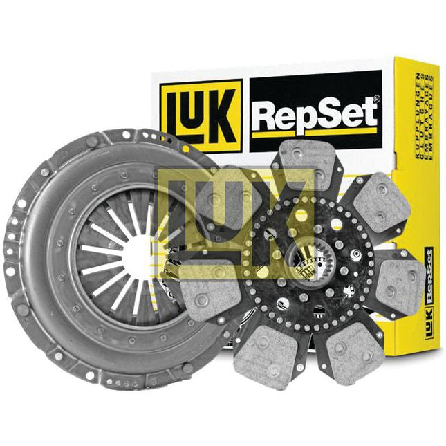A car clutch kit containing a pressure plate and friction disk, featuring a Sparex Captive Disc and Single Cover, displayed in front of a yellow and white box labeled "LuK RepSet", identified as Clutch Kit without Bearings - S.73169.