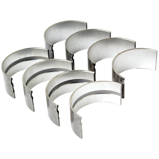 A set of eight Sparex semi-circular, silver metal engine bearing shells arranged in two rows, ideal for Massey Ferguson diesel engines, known as Conrod Bearing +0.010'' (0.25mm) Set | Sparex Part No.S.43169.