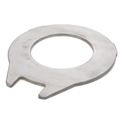 A metallic circular object with a large central hole and two protrusions on one side, known as the Massey Ferguson Counterplate 3795094M1 by AGCO, is typically used as an industrial component in agricultural machinery like the Massey Ferguson 5400 Series tractor.