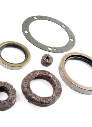 Assorted mechanical gaskets and seals of various sizes and materials, including a specialized Sparex Crankshaft Seal Kit (Part No. S.61503) for Massey Ferguson, arranged on a white background.