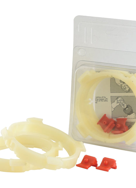 Plastic hardware components, including three beige rings and red clips, displayed next to a partially open blister package with an illustration of Sparex EASYLOCK BEARINGS 2X82MM X-L (Sparex Part No. S.59633).