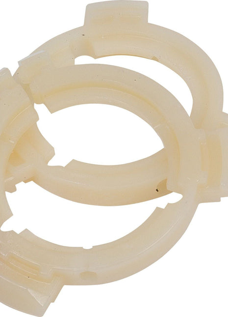 Two interlocking circular plastic rings with gear-like edges, potentially components for a mechanical or industrial application, resemble the EASYLOCK B/RINGS 2x41 (Small) by Sparex, Part No.S.56500.