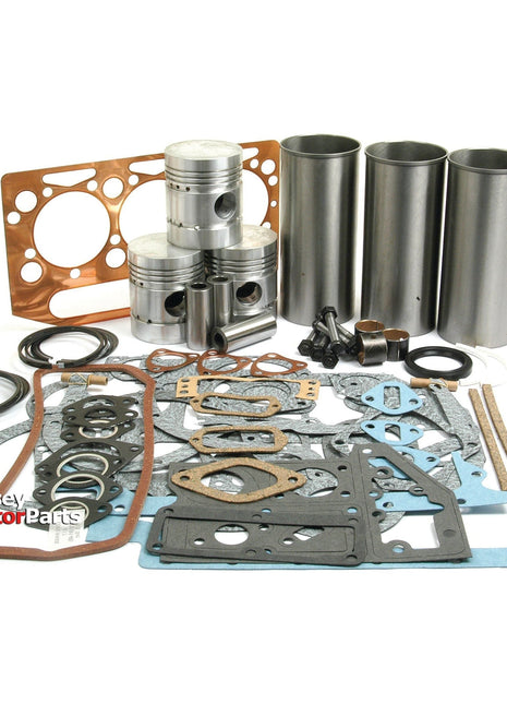 A collection of tractor engine parts from the Engine Overhaul Kit without Valve Train (Finished) - S.41883 by Sparex, featuring pistons, gaskets, seals, and sleeves for a Perkins Engine A3.152, arranged on a white background. The "Massey Tractor Parts" logo is visible in the bottom left corner.