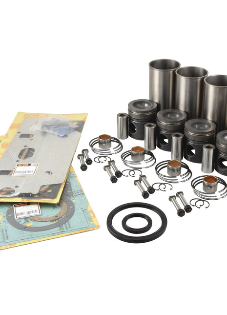 A neatly arranged collection of various engine parts, including pistons, rings, gaskets, o-rings, and sleeves for the AT4.236 engine model or Perkins engine overhaul kit by Sparex, displayed on a white background. This Engine Overhaul Kit without Valve Train (Finished) is identified as S.42769.