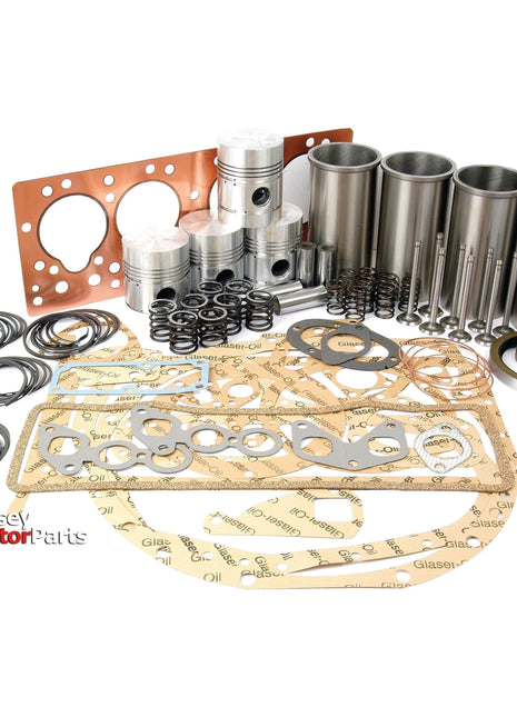 An Engine Overhaul Kit with Valve Train (Finished) - S.43020, featuring gaskets, pistons, sleeves, valves, and seals from the Sparex brand, laid out on a white surface with the "Massey Tractor Parts" logo in the lower left corner. Perfect for your Standard Engine 20C needs.
