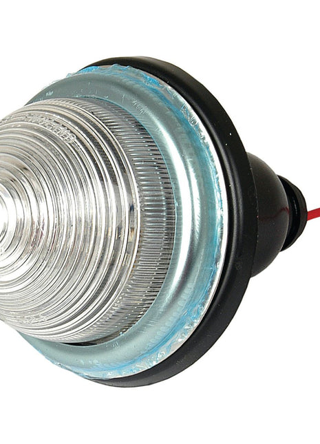 The Sparex Marker Light - Front Facing (Halogen), RH & LH, 12V - S.41131 features a round, clear lens with concentric ridges and a black rubber housing, along with a red wire extending from the back.